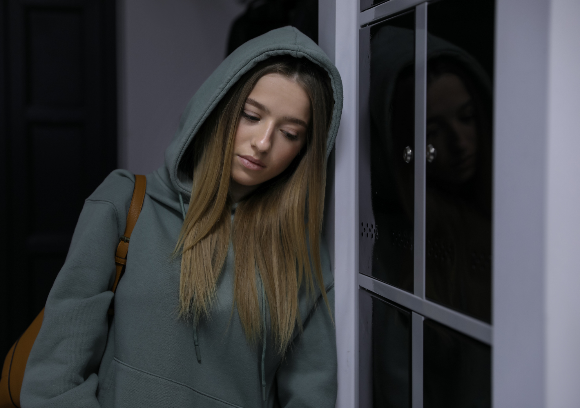 Young person experiencing loss and isolation